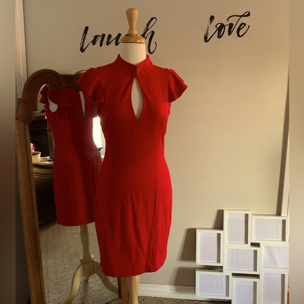 Nice in red , sexy dress From Bebe size M